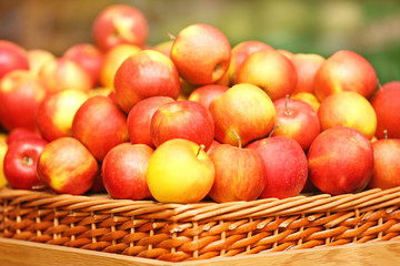 Basket with apples in market