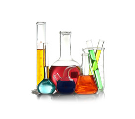 Laboratory glassware with samples on white background