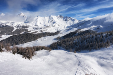 Fototapeta na wymiar aerial mountain view of Pila ski resort in winter, Aosta, Italy
