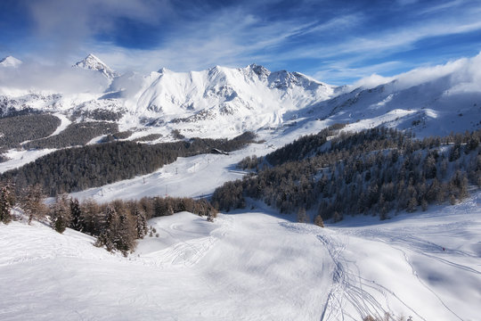 aerial mountain view of Pila ski resort in winter, Aosta, Italy