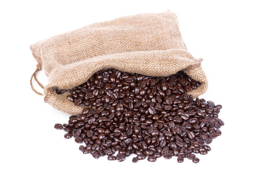 Coffee beans in burlap sack isolated on white © geargodz