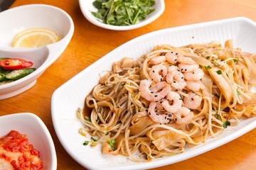 Delicious stir-fried rice noodles made from fresh mussels, shrimp, shellfish and seafood
