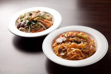 Delicious stir-fried rice noodles made from fresh mussels, shrimp, shellfish and seafood