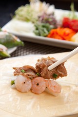 Fresh vegetables, delicious meat, rice noodles, rice wrapped with rice paper