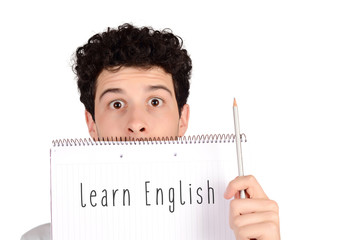 Student holding notebook and pencil with "learn Engish" text