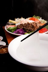 Fresh vegetables, delicious meat, rice noodles, rice wrapped with rice paper