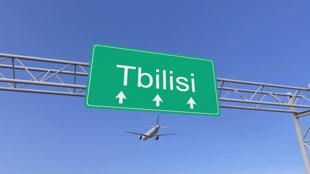 Twin engine commercial airplane arriving to Tbilisi airport. Travelling to Georgia conceptual 4K animation