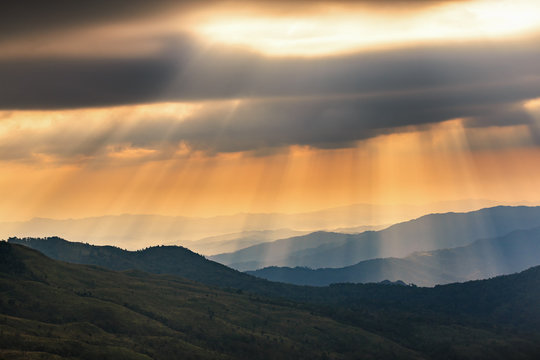 A beautiful sun rays with clouds in the morning used as for background 