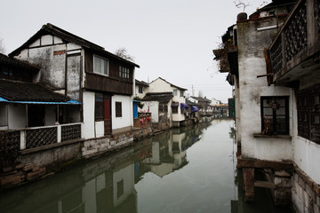 Fototapeta na wymiar ZHUJIAJIAO, CHINA - February 16, 2013: Located in a suburb of Shanghai city, Zhujiajiao is an ancient water town well-known throughout the country, with a history of more than 1700 years.