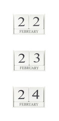 Closeup group of white wooden calendar with black 22 , 23 , 24 february word , three date calendar isolated on white background