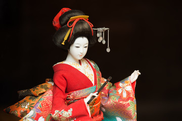 A geisha model made by silk. It is a silk crafts with traditional technology.