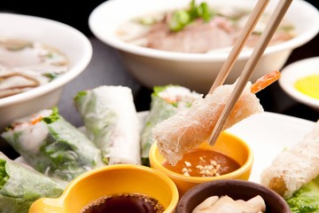 Fresh vegetables, various rolls of meat and crispy fried