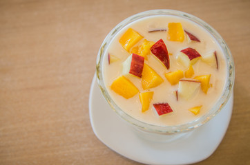 Yogurt fruit salad with apple and mango