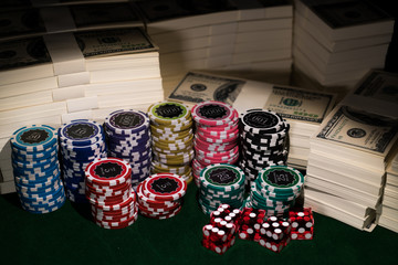 Stack 1 million US dollars bill with row chips and dices