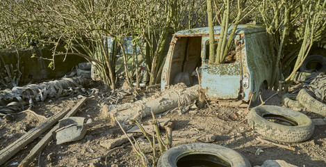 Derelict car in an old farmyard