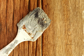 Old and dirty paint brush represent painting equipment material concept related idea.