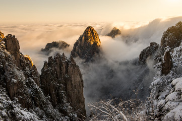 Beautiful morning landscape of Huangshan mountain at first snow