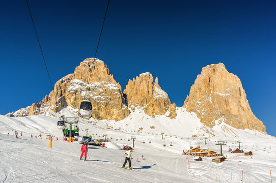 Sunny view of ski slope at Col Rodella valley near Canazei of Val di Fassa, Trentino-Alto-Adige region, Italy.