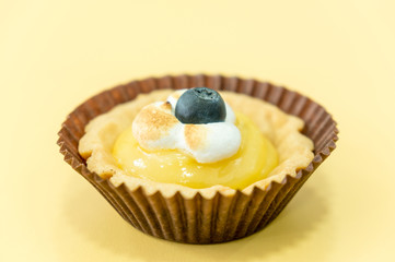 Passion fruit tart with blueberry on top