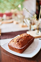Traditional homemade cake on wooden table background. Rustic style.