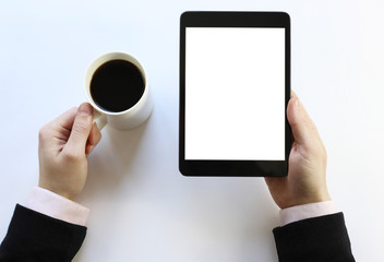 tablet in his hands. The working environment