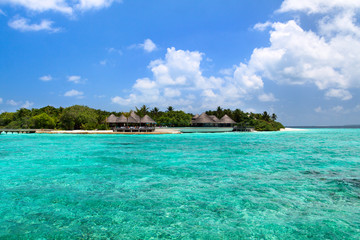 Lagoon and beach bungalows on Maldives Island