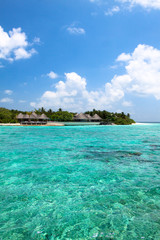 Lagoon and beach bungalows on Maldives Island