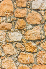 Wall of stones and concrete, background