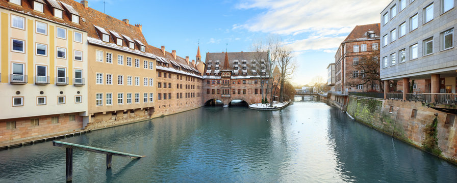 Winter landscape of The Hospital of the Holy Spirit on Pegnitz river in Nuremberg, Bavaria, Germany