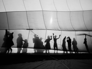 Black and white of Hot air balloon and silhouette of people