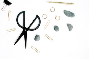 Home office workspace with scissors, clips and female accessories. Flat lay, top view