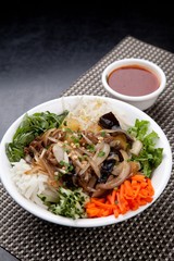 Fresh Vegetables, Raw Meat Topped with Bunbossao 