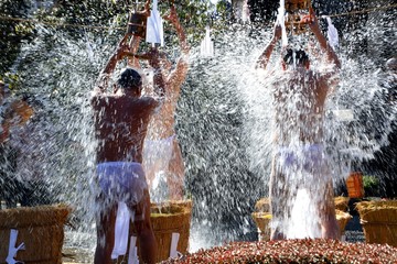 Mizugori (in japanese) - to purify oneself by pouring cold water upon oneself.