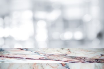 white marble stone countertop or table on white blurred abstract background / for display or montage your products