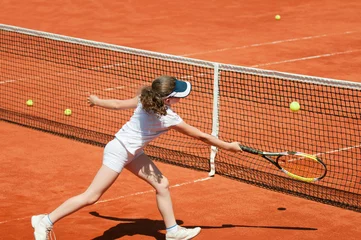 Tuinposter Tennis junior on the net © Microgen