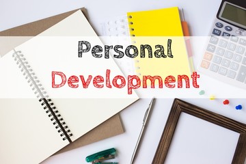 Text personal development on white paper book on table / business concept