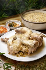 nokdu baeksuk. Boiled Chicken with Rice and Mung Beans