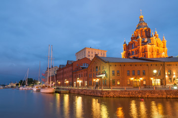 Uspenski cathedral of Finnish Orthodox church by Helsinki harbor in June, Finland  