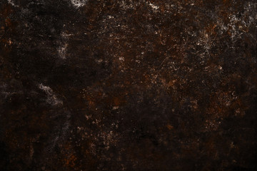 Dark grunge rusty metal background. Metal texture with corrosion and oxides 