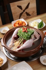 hanbang baeksuk. Boiled Chicken with Rice andMedicinal Herbs