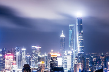 Fototapeta premium modern office buildings in shanghai at night