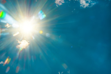 sun in the blue sky, closeup, natural background