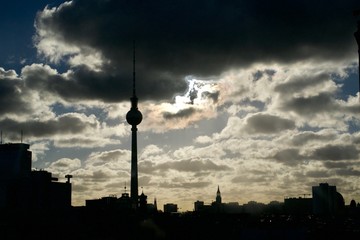 Moody stormy sunset over the Fernsehturm Tower