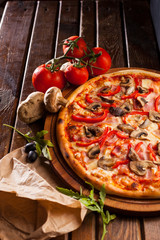 Pizza on wooden desk