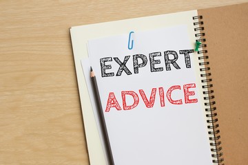 Text Expert advice on white paper with pencil on the desk / business concept