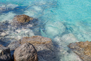 Stones and transparent turquoise water