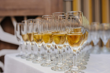 Composition of champagne glasses on the table