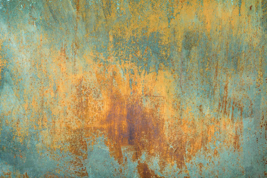 texture of old rusty shabby background with scratches, with the remnants of blue paint