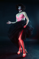 model with makeup clown in corset