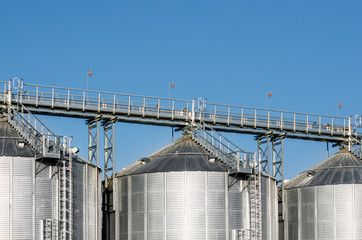 The complex silo installations for the storage of grain standing in the plowed